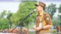 Bupati Muaro Jambi Dr Bambang Bayu Suseno Memimpin Upacara Apel Gabungan Pasca Idul Fitri 1447 H di Halaman Kantor Bupati Komplek Bukit Cinto Kenang