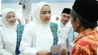 0327 Ketua Badan Kontak Majelis Taklim (BKMT) Kabupaten Muaro Jambi, Ririn Novianty, menghadiri launching Pengajian Akbar BKMT tingkat Kecamatan Maro Sebo yang digelar di Masjid Baithussholihin